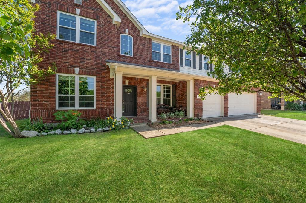 3101 Clear Springs Drive Forney, TX 75126 - Photo 1 of 1 a front view of a house with a garden