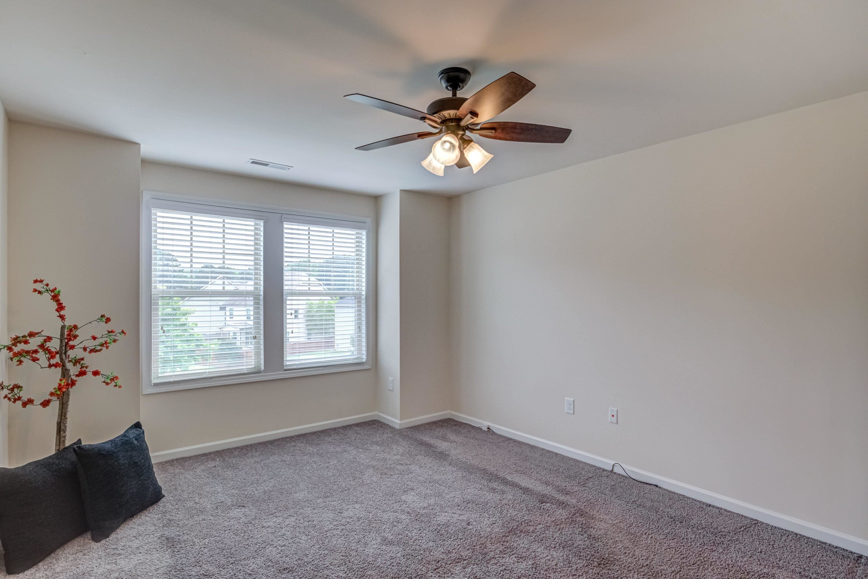 7817 Elmshire Way Raleigh, NC 27616 - Photo 25 of 46 a view of an empty room with a window