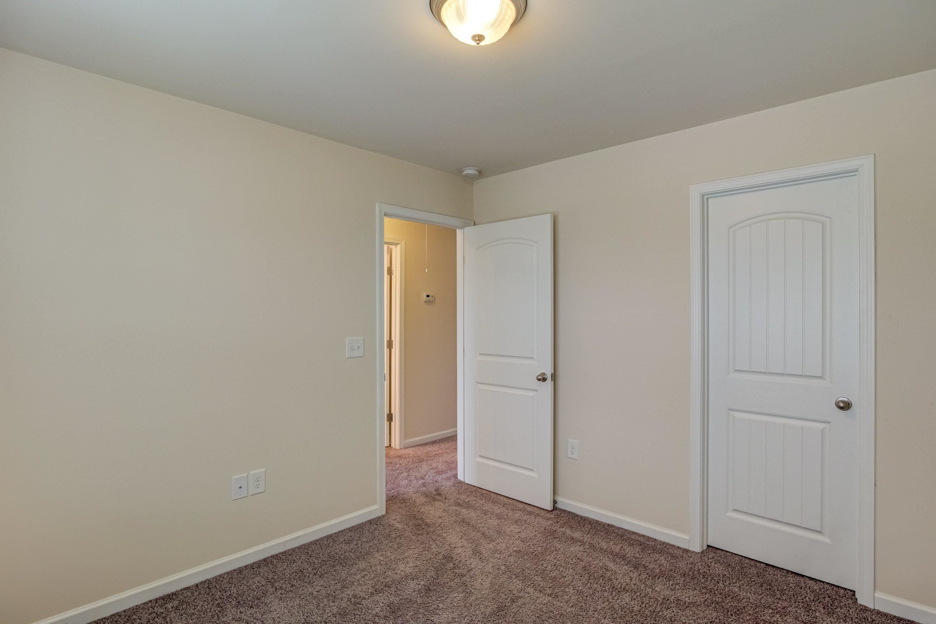 7817 Elmshire Way Raleigh, NC 27616 - Photo 34 of 46 a view of an empty room