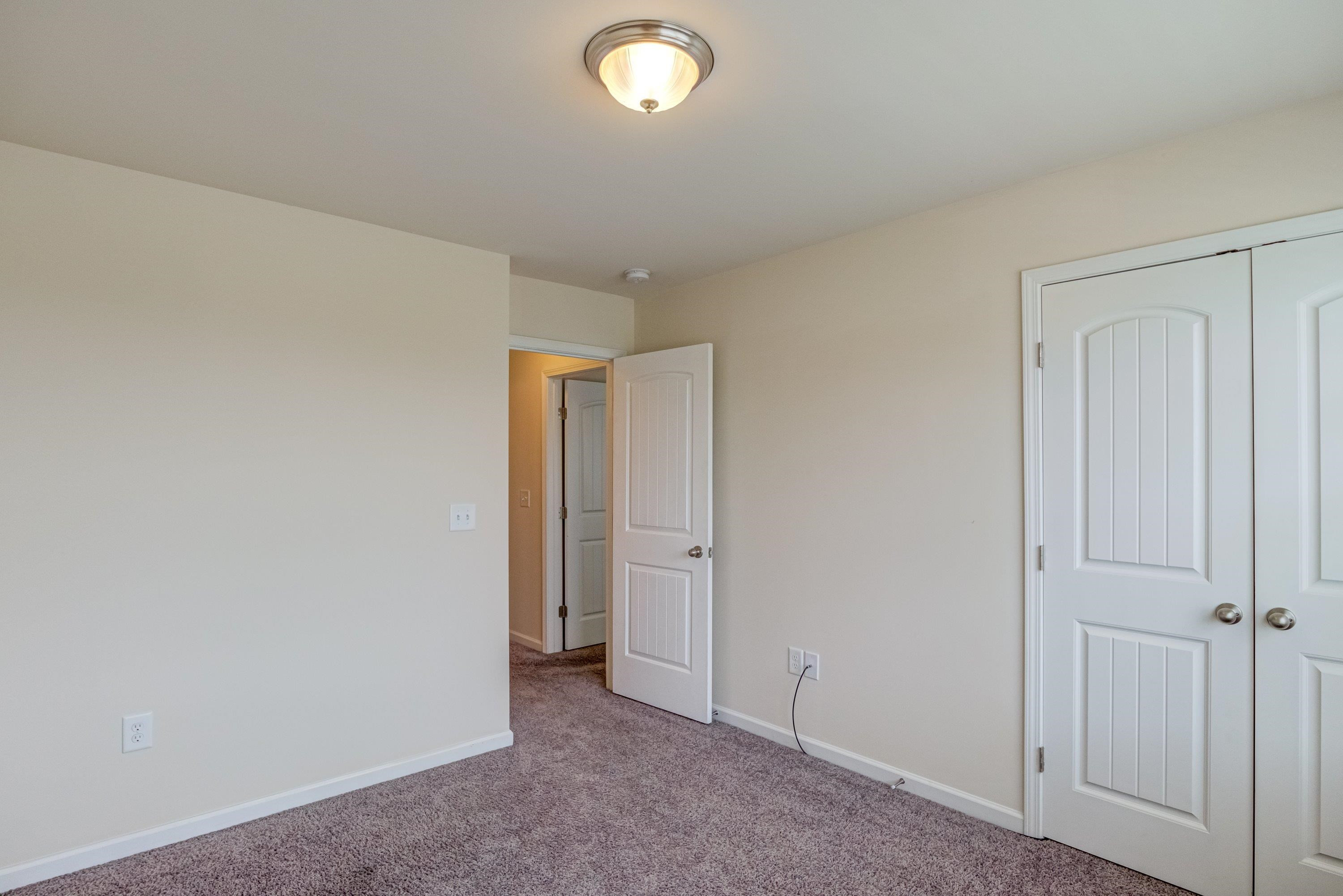 7817 Elmshire Way Raleigh, NC 27616 - Photo 36 of 46 a view of an empty room