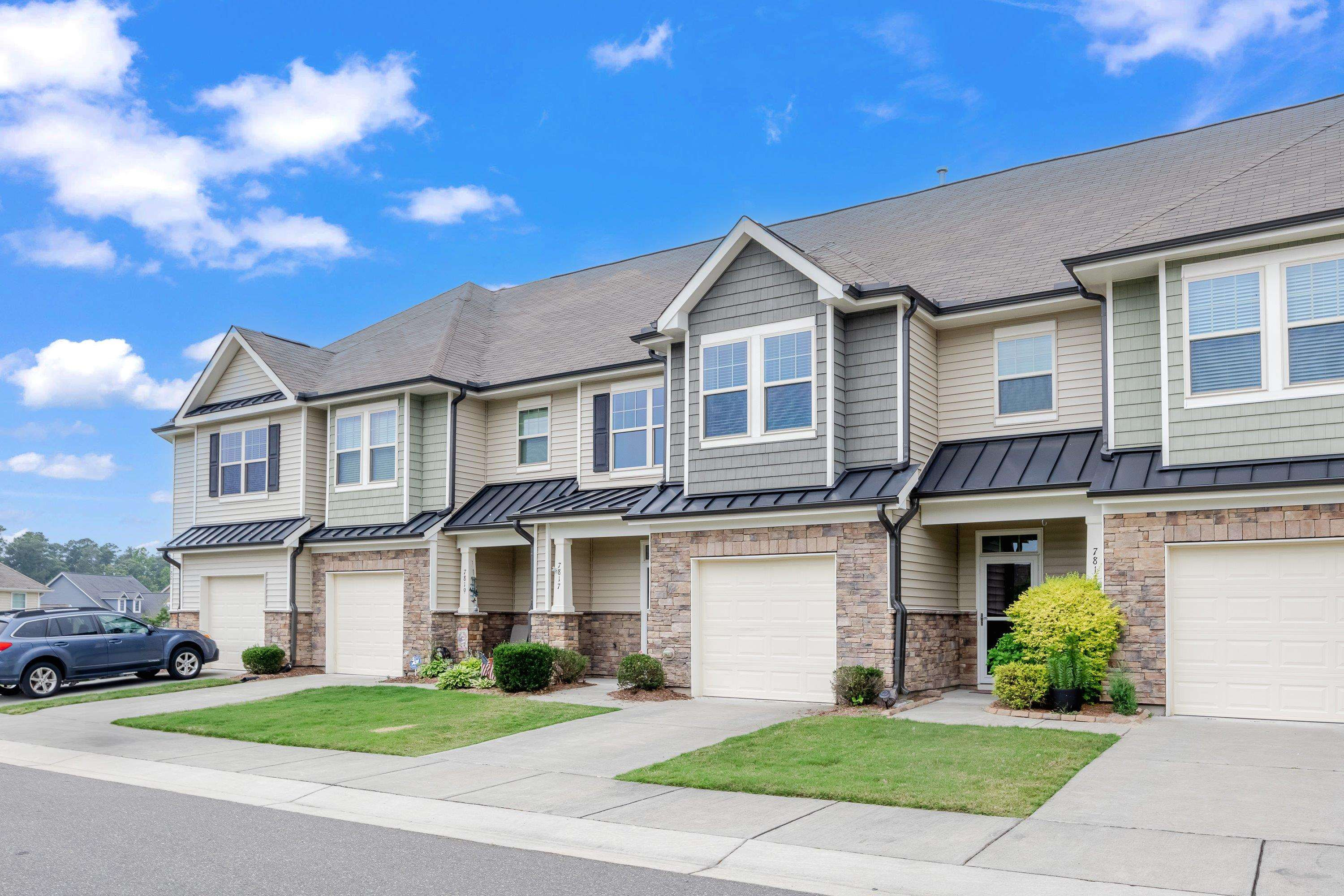 7817 Elmshire Way Raleigh, NC 27616 - Photo 43 of 46 a front view of a house with a yard