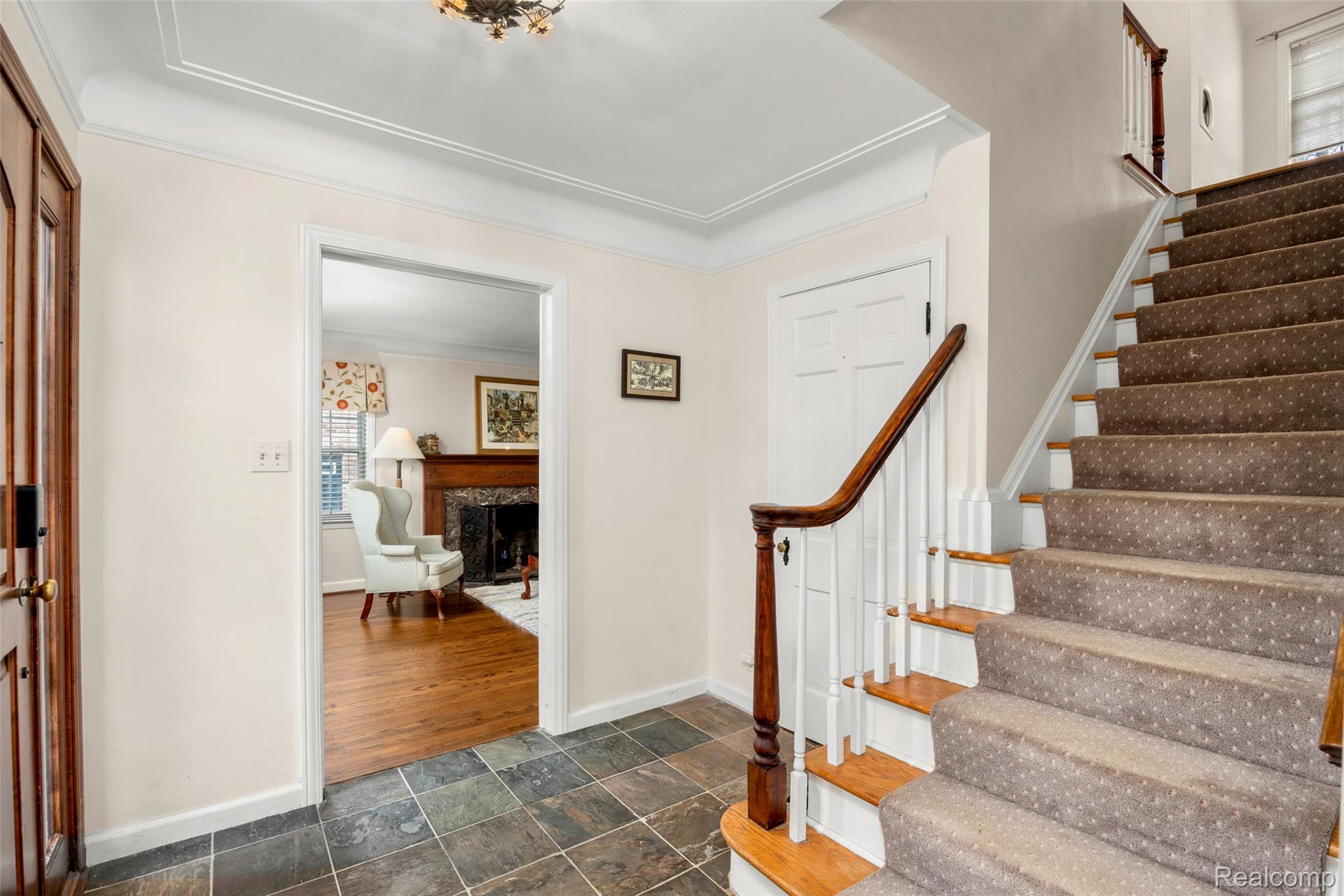 244 Kerby Road Grosse Pointe, MI 48236 - Photo 10 of 53 Foyer entrance with stone finish flooring and ornamental molding