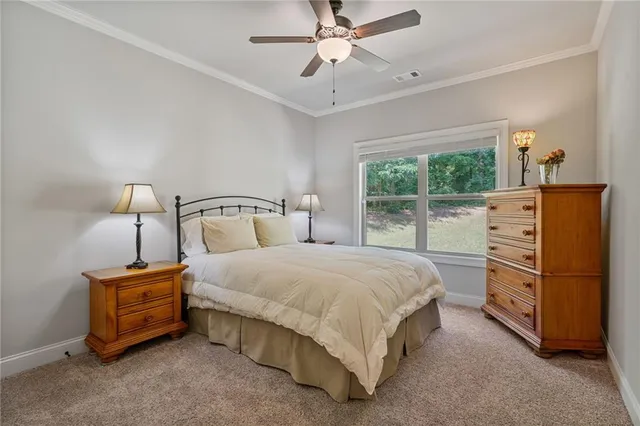 a bedroom with a bed and large cabinets