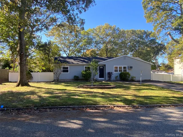 a view of a house with a big yard