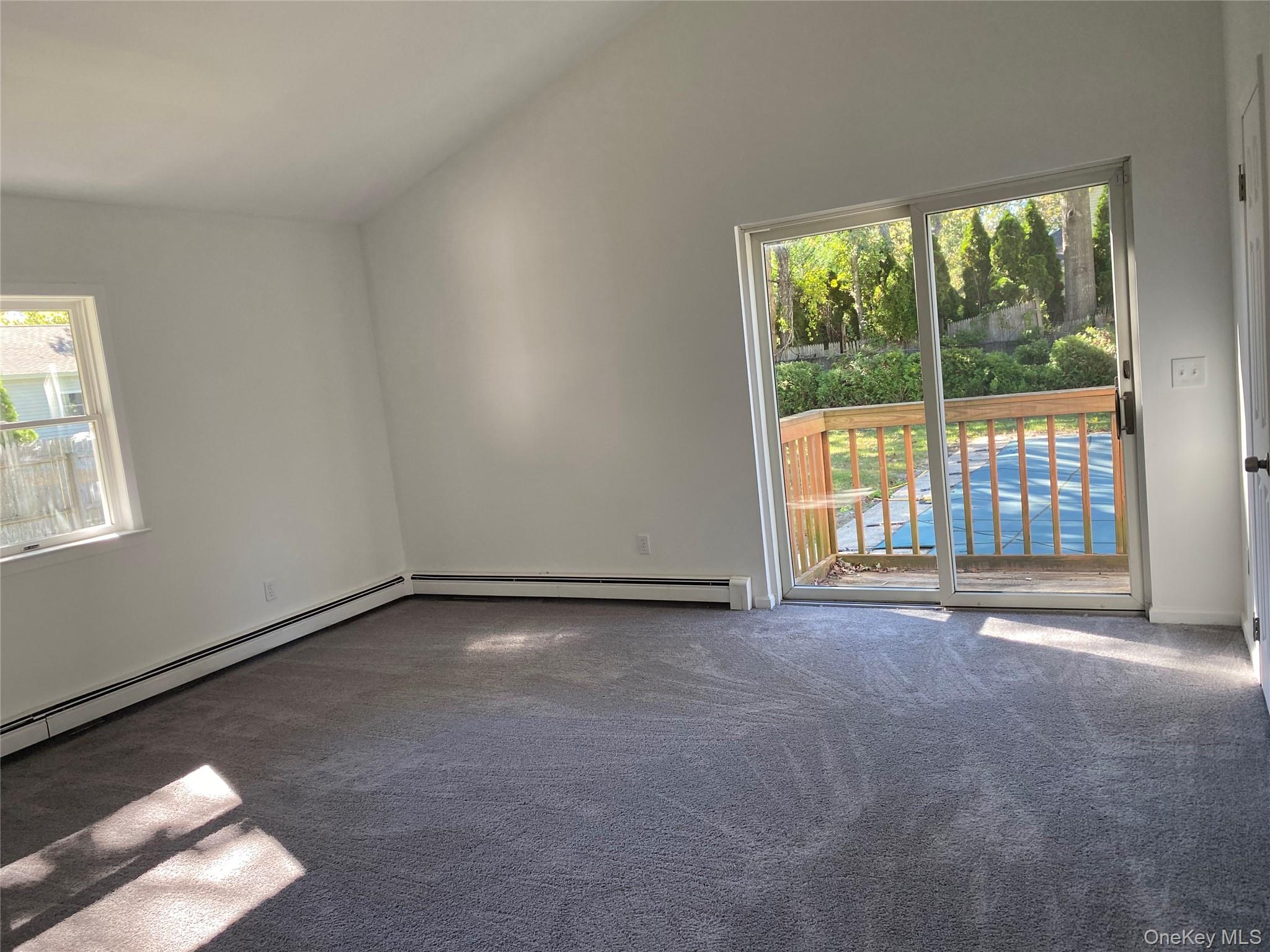 7 Filmore Avenue Coram, NY 11727 - Photo 15 of 22 a view of an empty room with a window