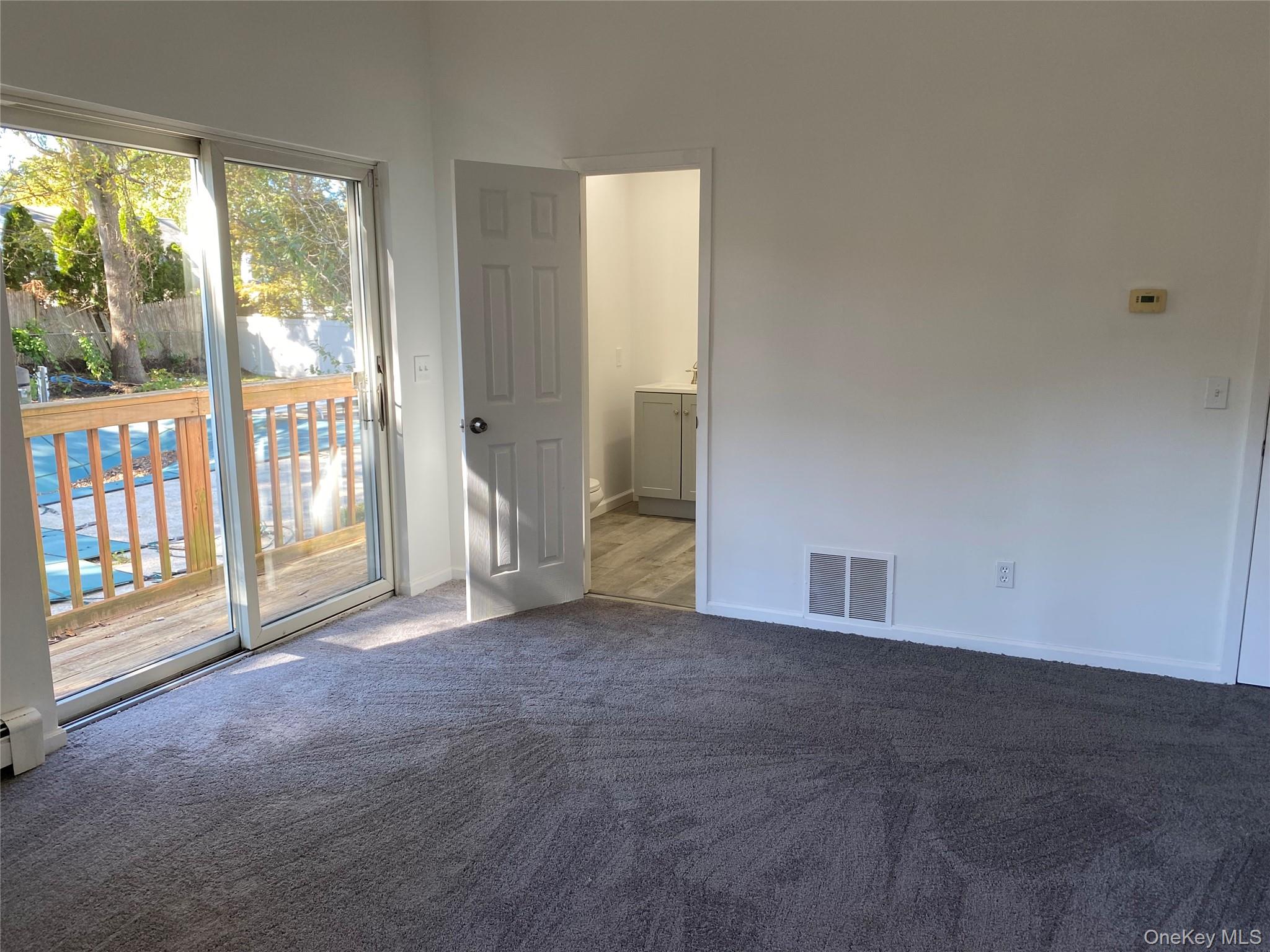 7 Filmore Avenue Coram, NY 11727 - Photo 16 of 22 a view of an empty room with a window