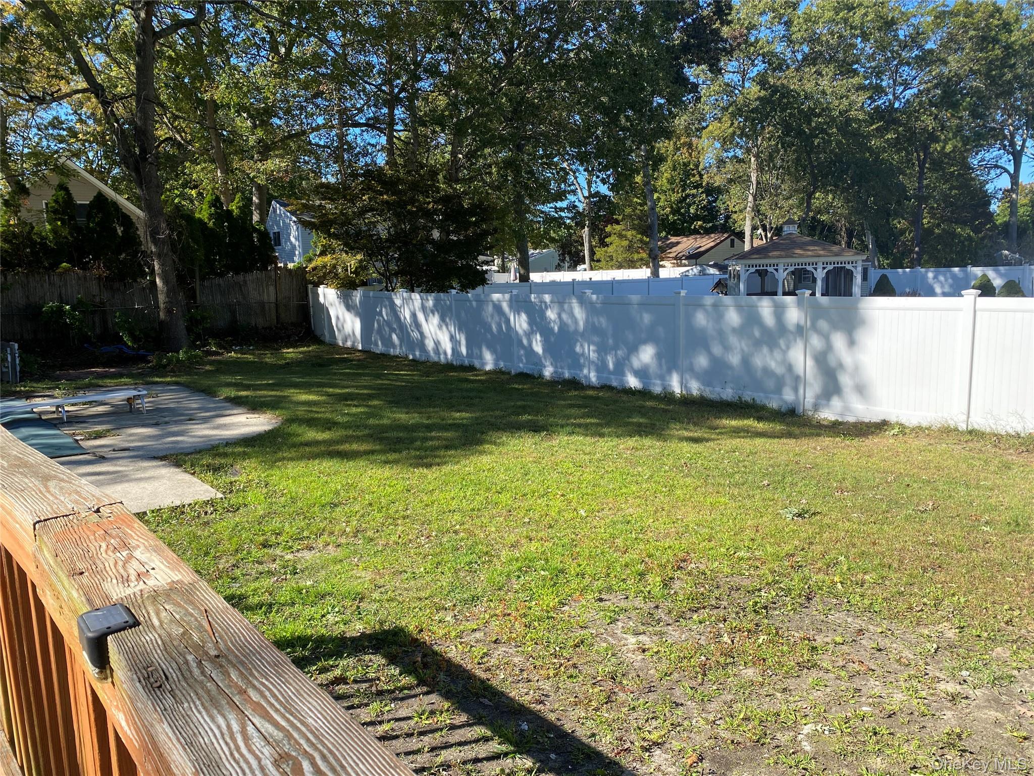 7 Filmore Avenue Coram, NY 11727 - Photo 22 of 22 a view of a pool with a yard