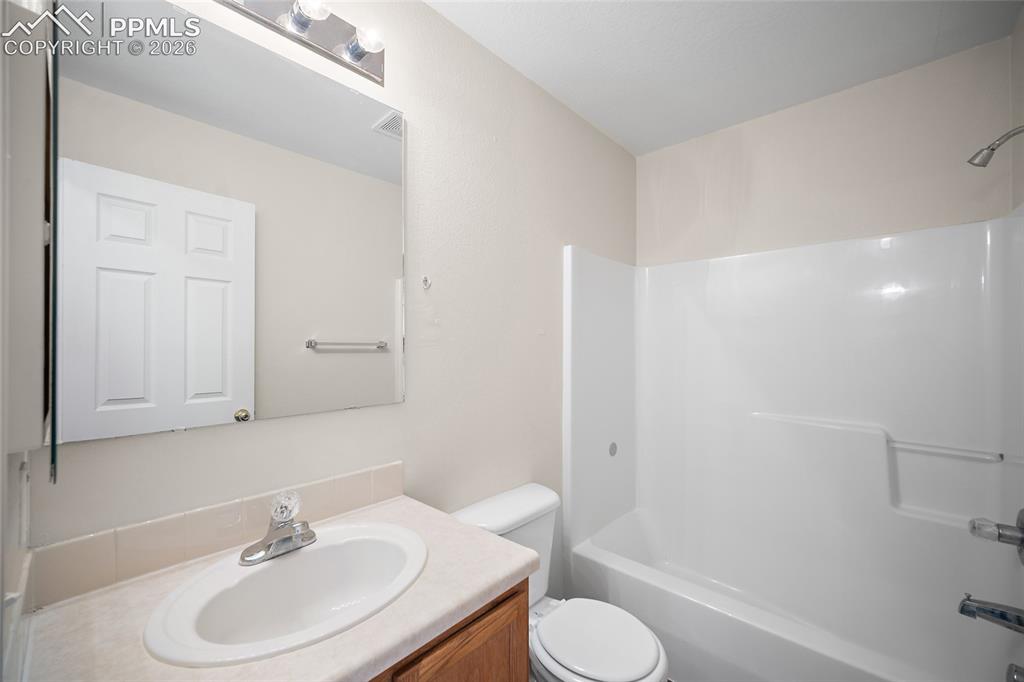 4400 Rawhide Road, Unit 157 Pueblo, CO 81008 - Photo 20 of 36 a bathroom with a sink toilet and shower