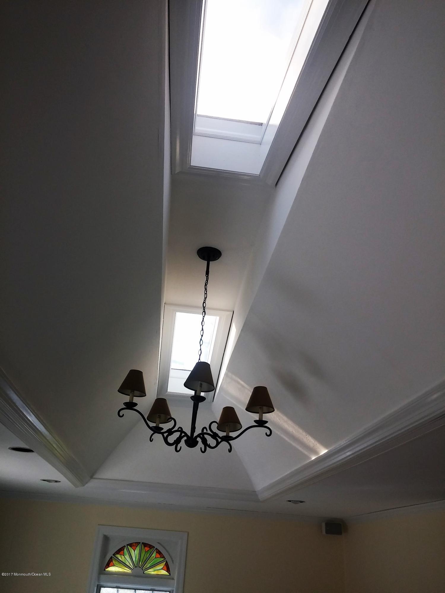 368 Bennington Road Freehold, NJ 07728 - Photo 20 of 35 skylit vaulted ceiling in great room