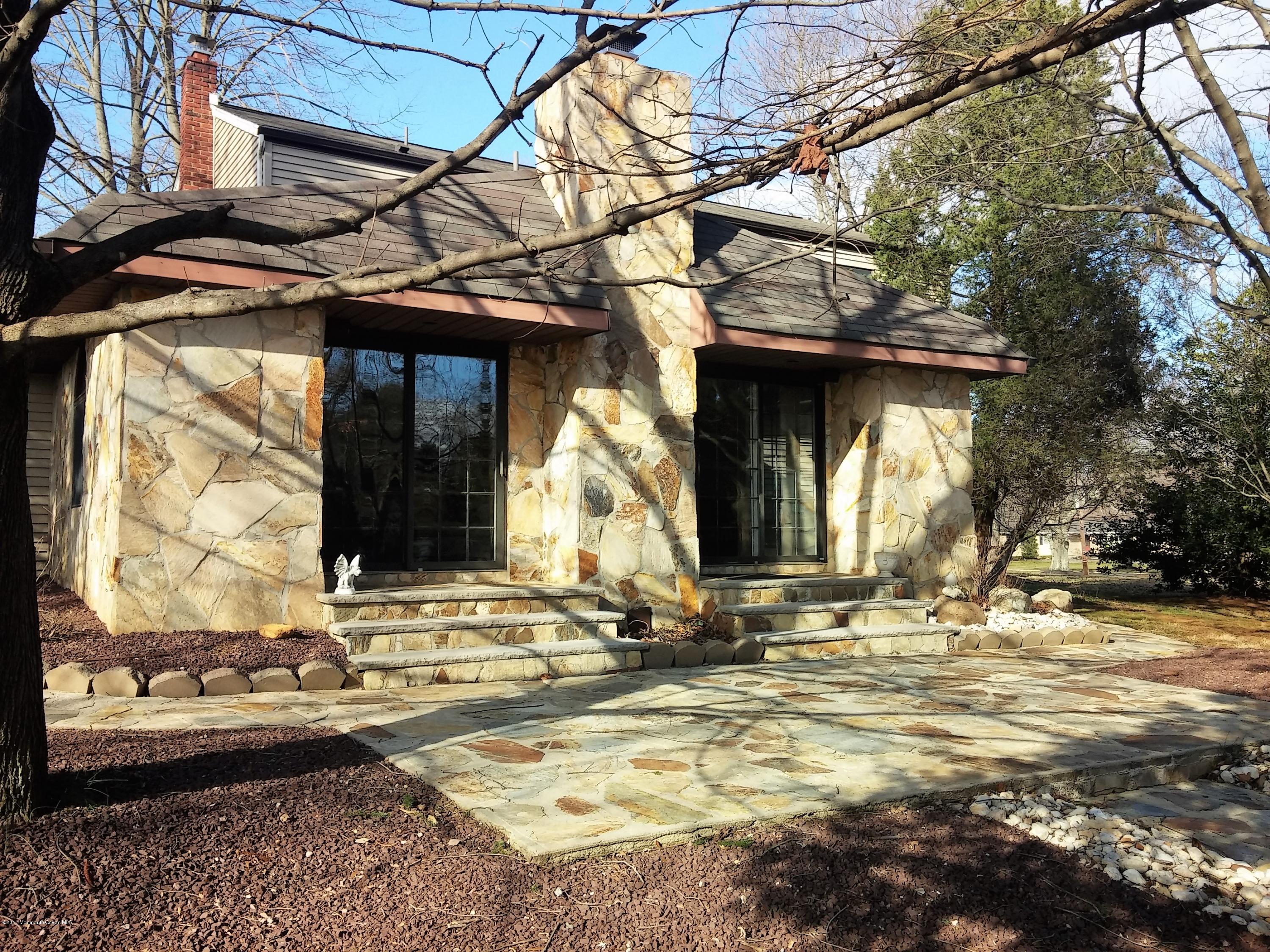 368 Bennington Road Freehold, NJ 07728 - Photo 5 of 35 great room addition and flag stone patio