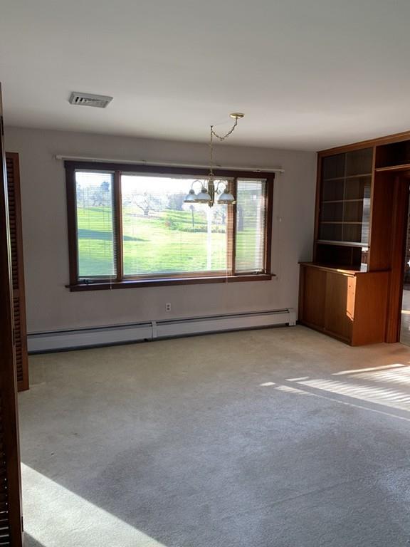 190 Chace Hill Road Sterling, MA 01564 - Photo 22 of 42 a view of an empty room with a window