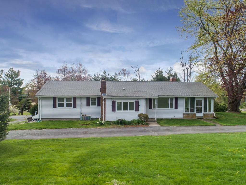 190 Chace Hill Road Sterling, MA 01564 - Photo 3 of 42 a front view of a house with a garden