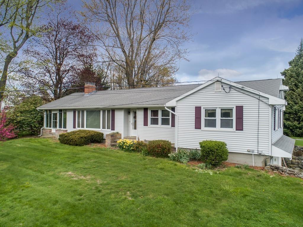 190 Chace Hill Road Sterling, MA 01564 - Photo 5 of 42 a view of a house with a yard and sitting area