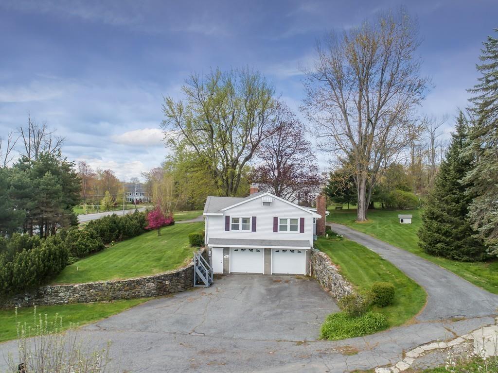 190 Chace Hill Road Sterling, MA 01564 - Photo 8 of 42 a view of a house with backyard and garden