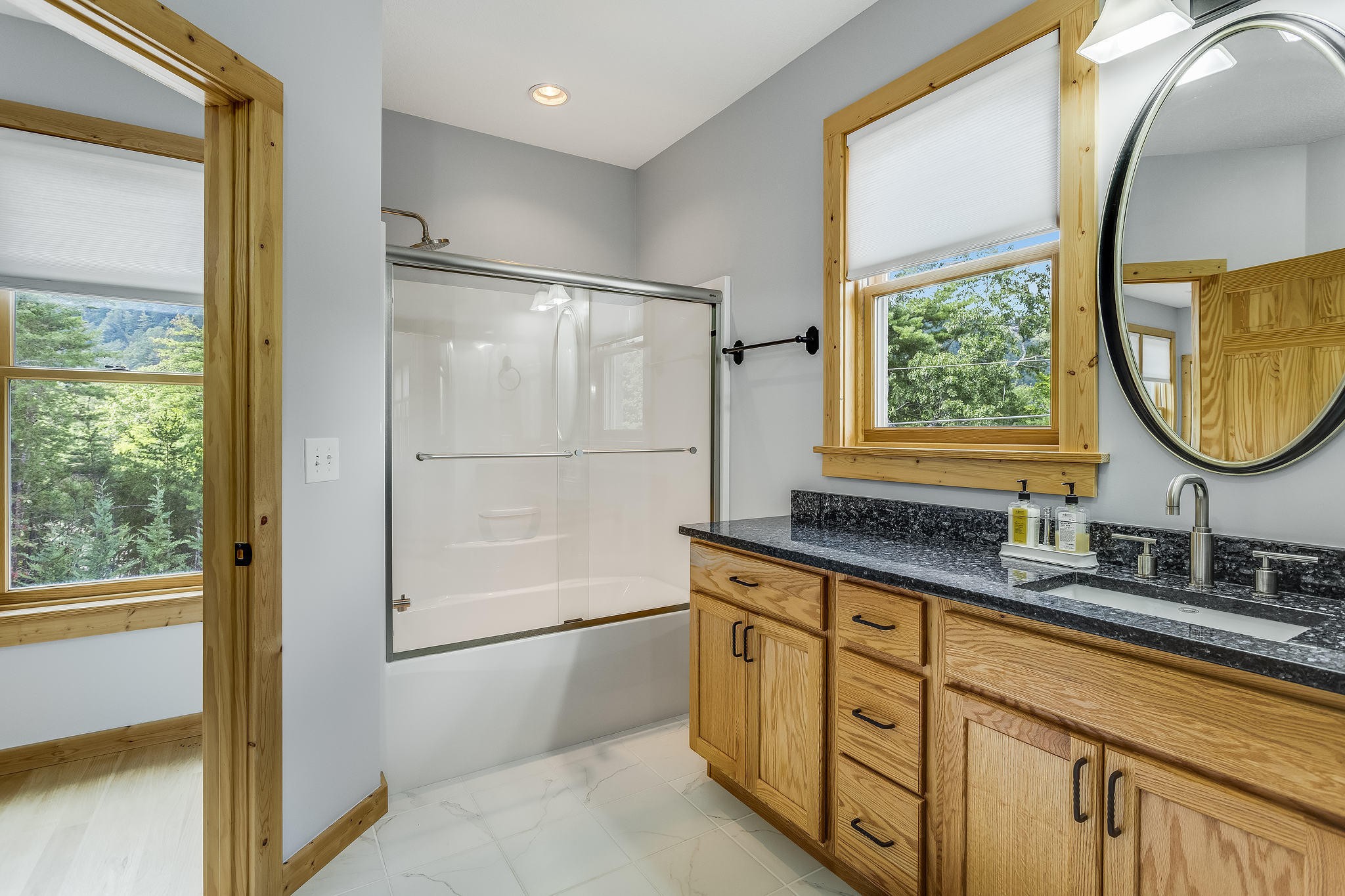 163 Kelly Ridge Road Townsend, TN 37882 - Photo 25 of 40 a bathroom with a double vanity sink mirror and a bathtub
