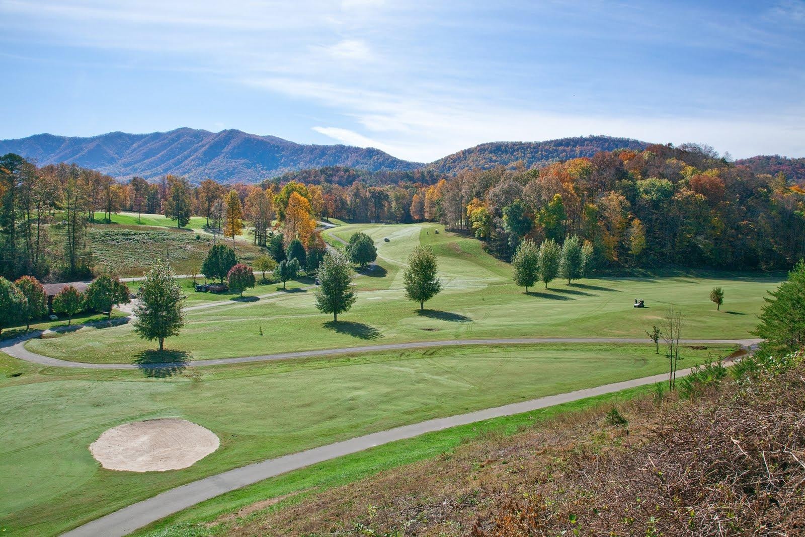 163 Kelly Ridge Road Townsend, TN 37882 - Photo 3 of 40 a view of a grassy area with mountains and a mountain view