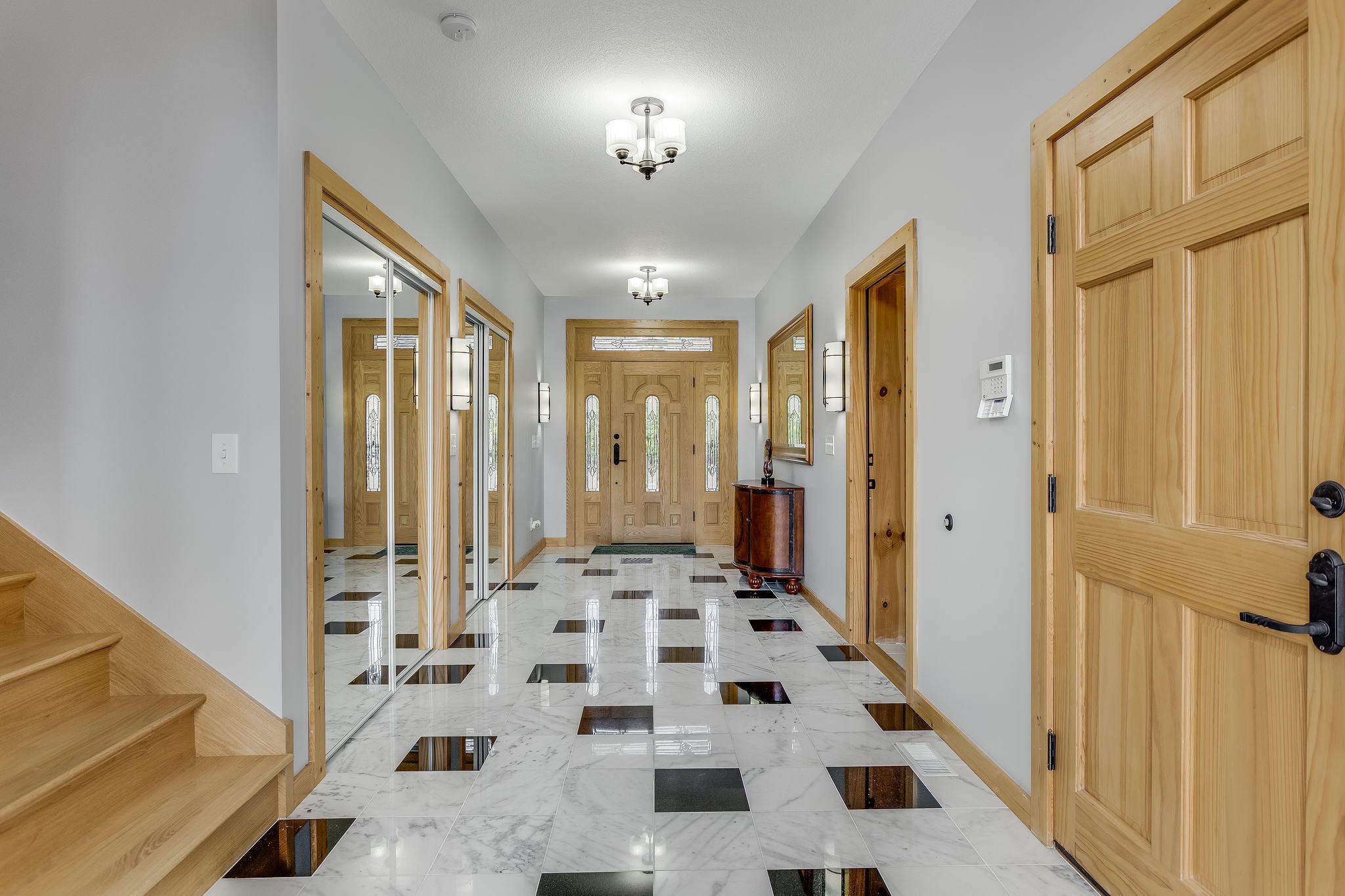 163 Kelly Ridge Road Townsend, TN 37882 - Photo 9 of 40 a view of a hallway with windows and chandelier