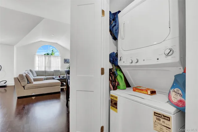 a bedroom with a bed and a mirror