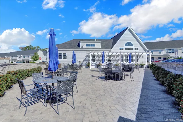 a view of a livingroom with furniture and hardwood floor