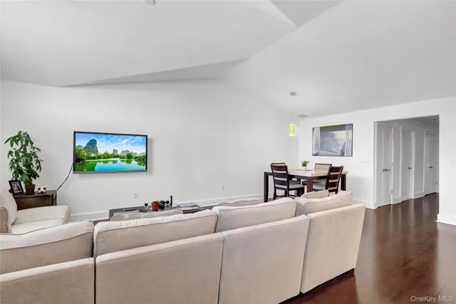 a kitchen with stainless steel appliances a refrigerator stove microwave and sink