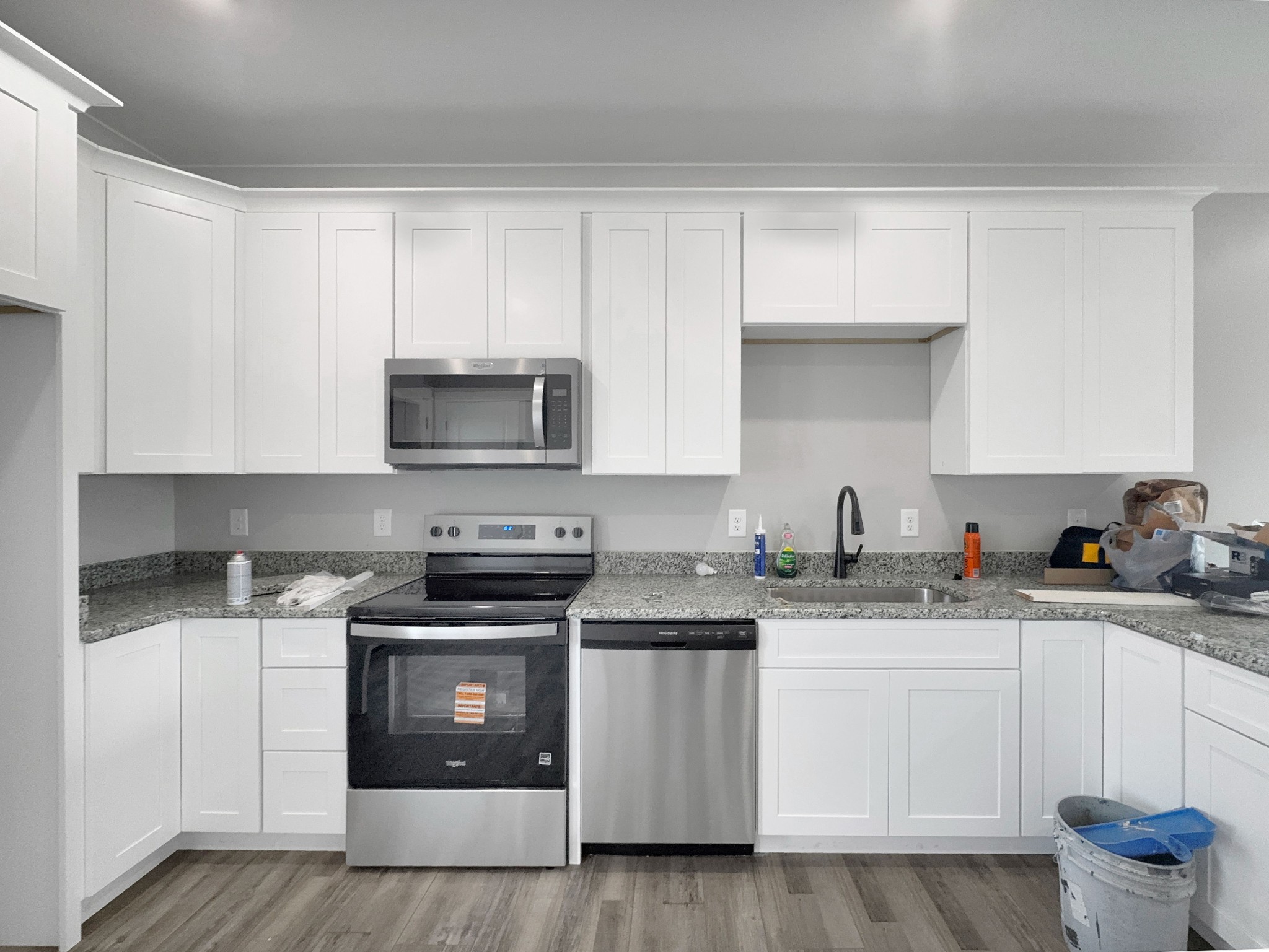 181 Rock House Hollow Road Bethpage, TN 37022 - Photo 17 of 50 a kitchen with stainless steel appliances granite countertop a sink and a stove