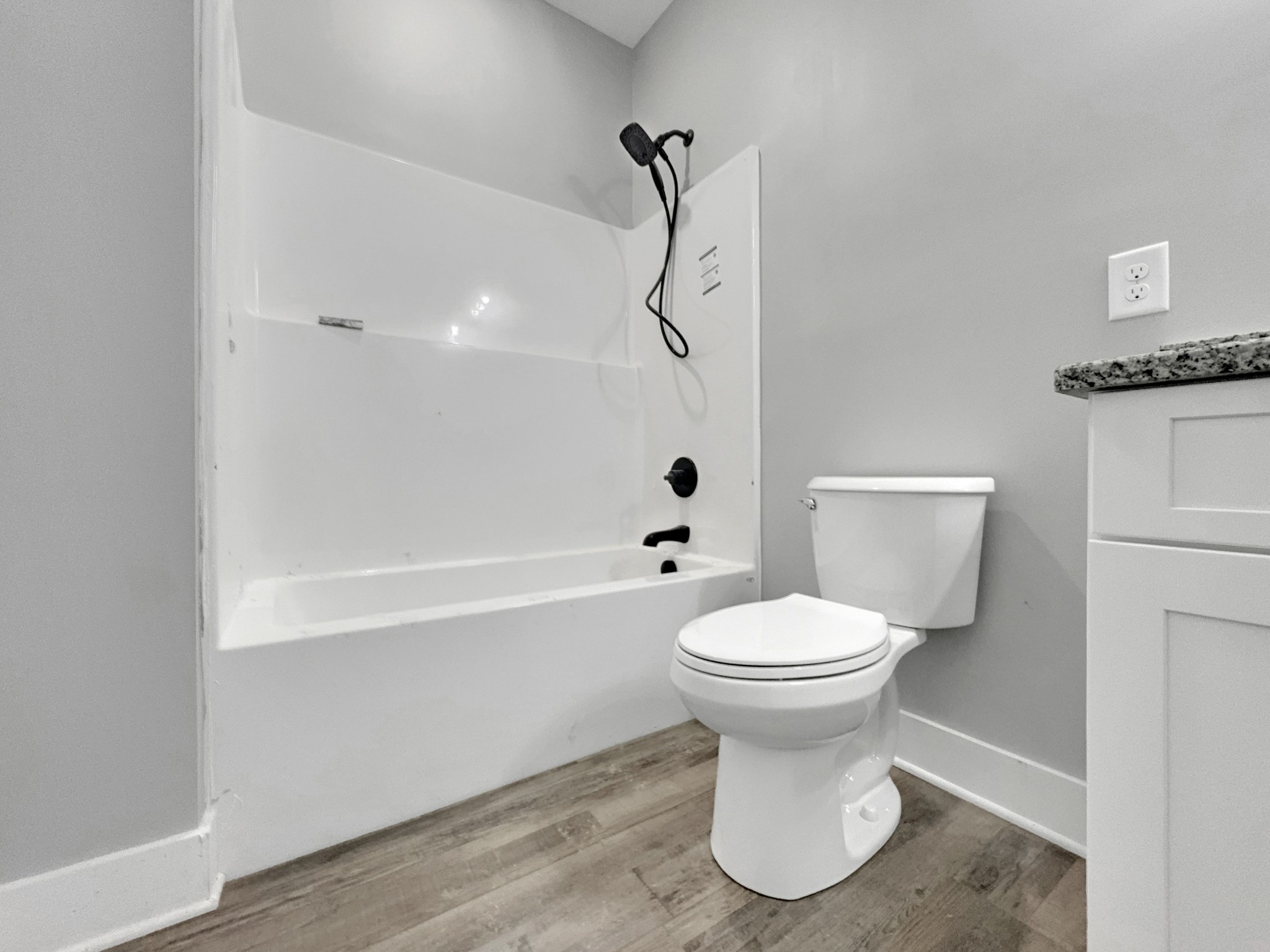 181 Rock House Hollow Road Bethpage, TN 37022 - Photo 24 of 50 a bathroom with a toilet sink and a shower