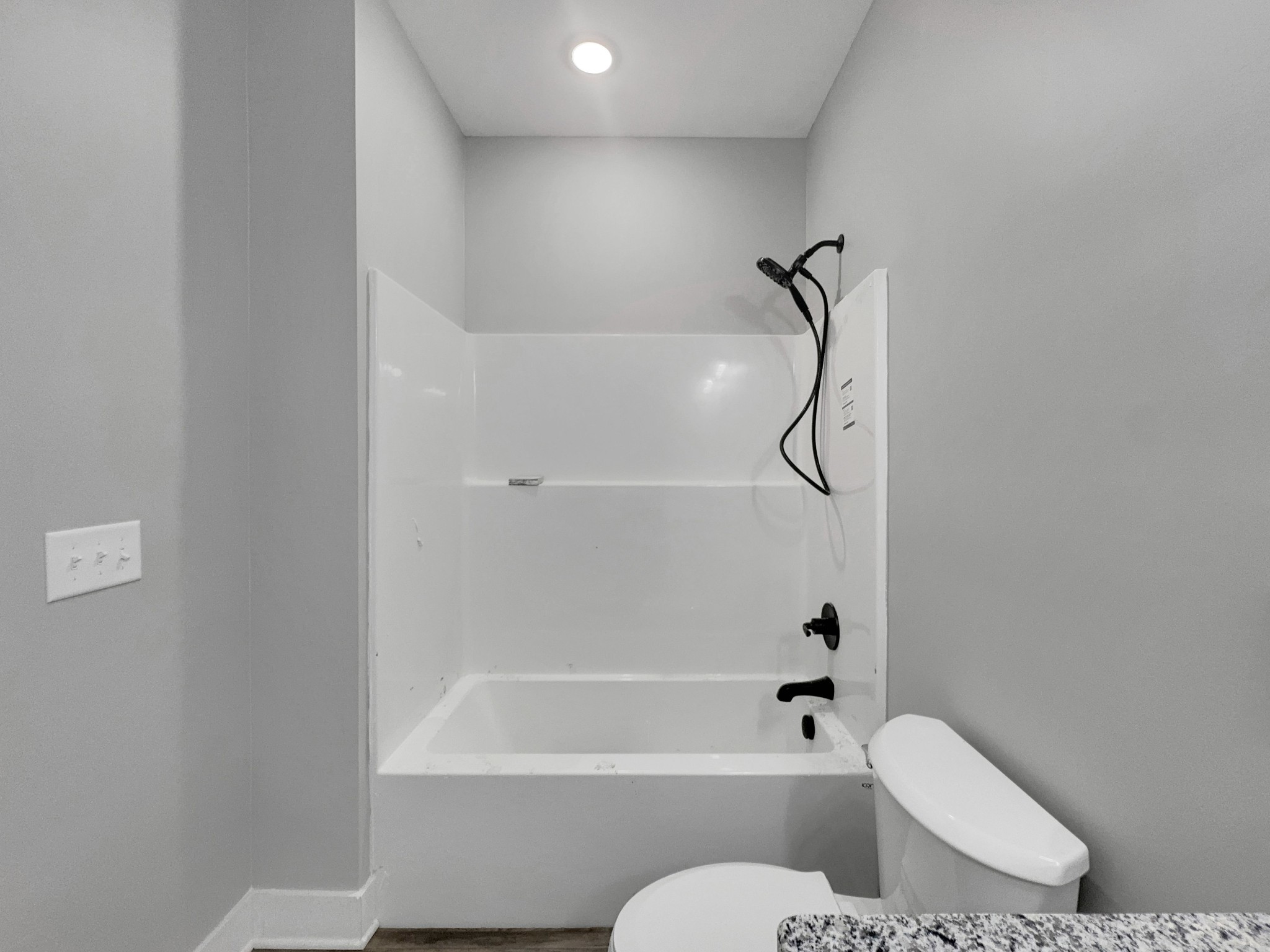 181 Rock House Hollow Road Bethpage, TN 37022 - Photo 25 of 50 a bathroom with a toilet and a shower