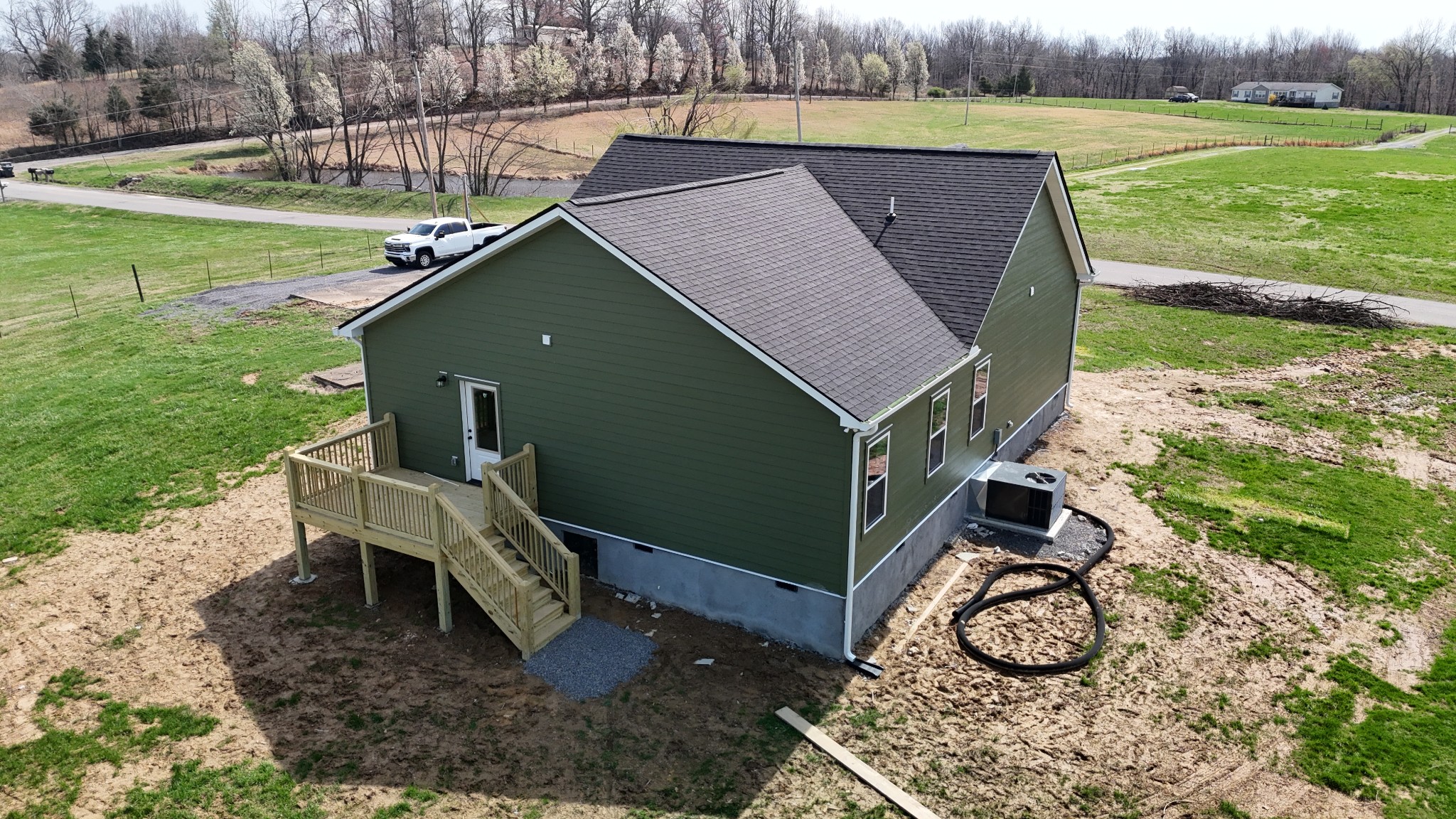 181 Rock House Hollow Road Bethpage, TN 37022 - Photo 38 of 50 a house with trees in the background