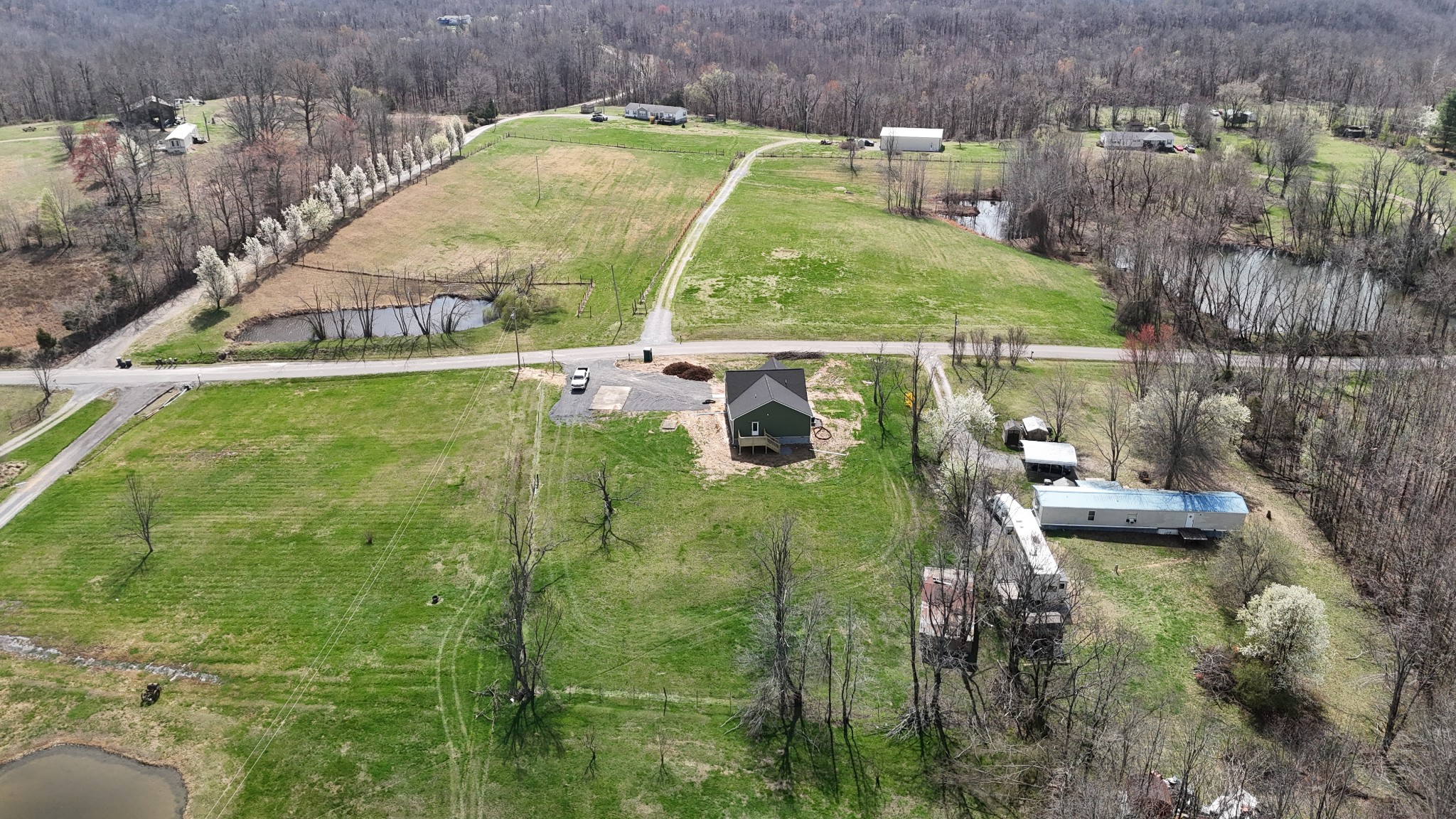 181 Rock House Hollow Road Bethpage, TN 37022 - Photo 44 of 50 a view of a lake in front of house