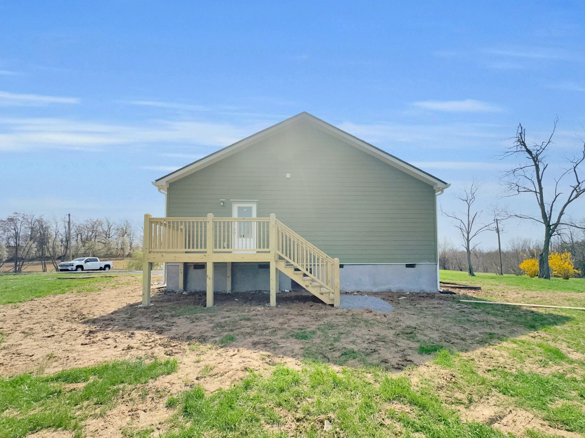 181 Rock House Hollow Road Bethpage, TN 37022 - Photo 7 of 50 a view of a house with a yard