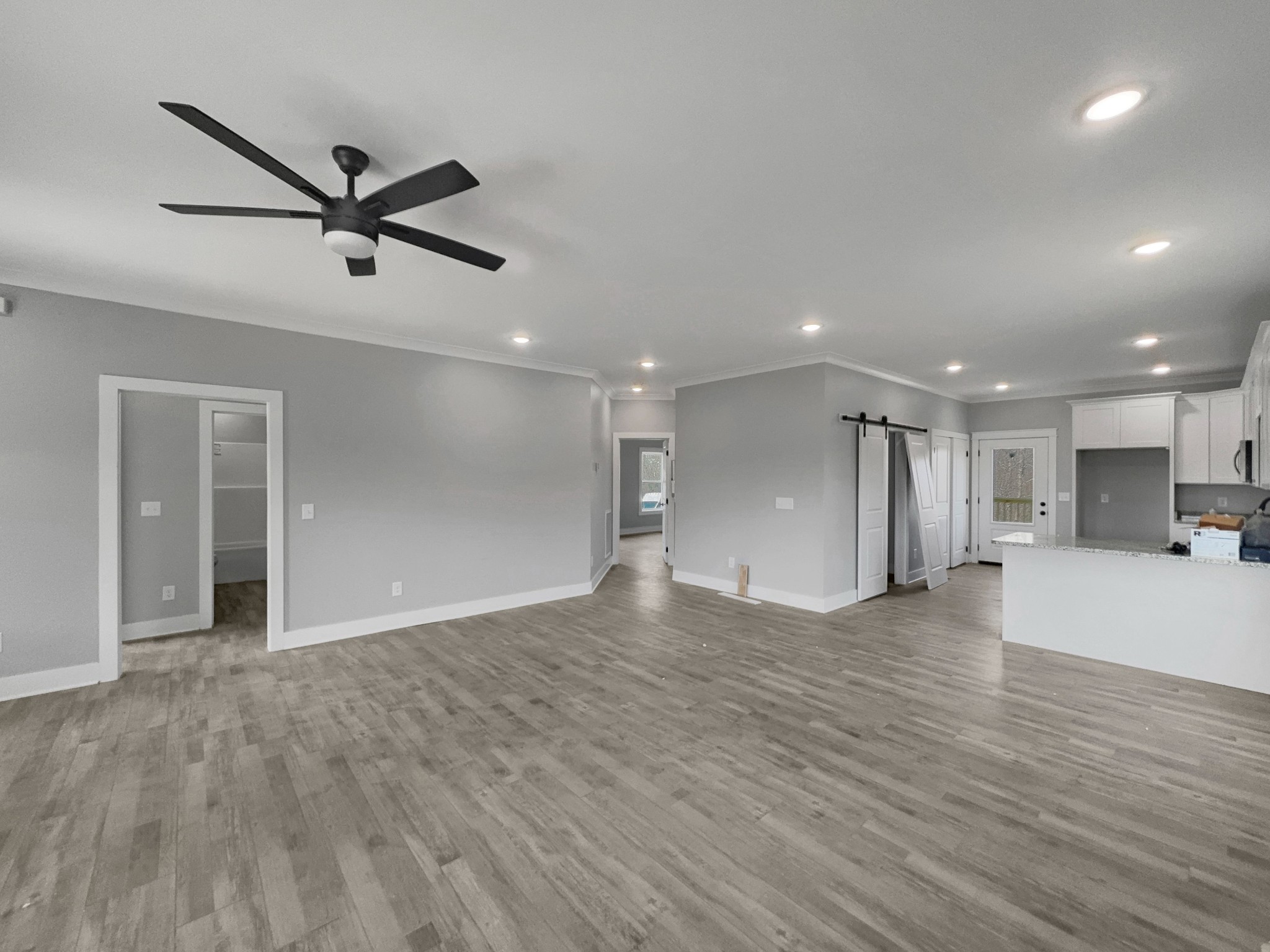 181 Rock House Hollow Road Bethpage, TN 37022 - Photo 10 of 50 a view of empty room with wooden floor and window