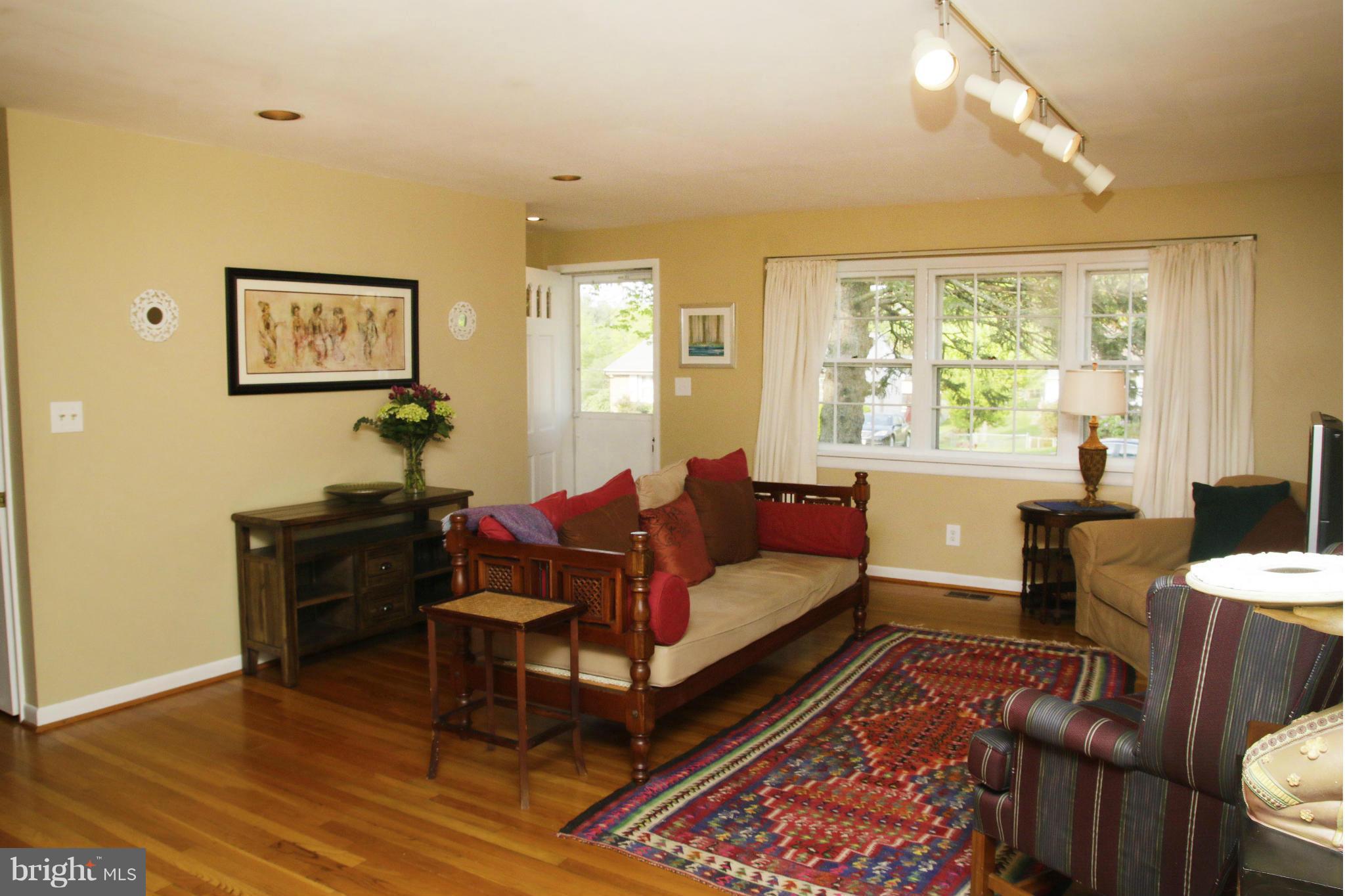 4019 Starbrook Road Randallstown, MD 21133 - Photo 2 of 28 a living room with furniture and a large window