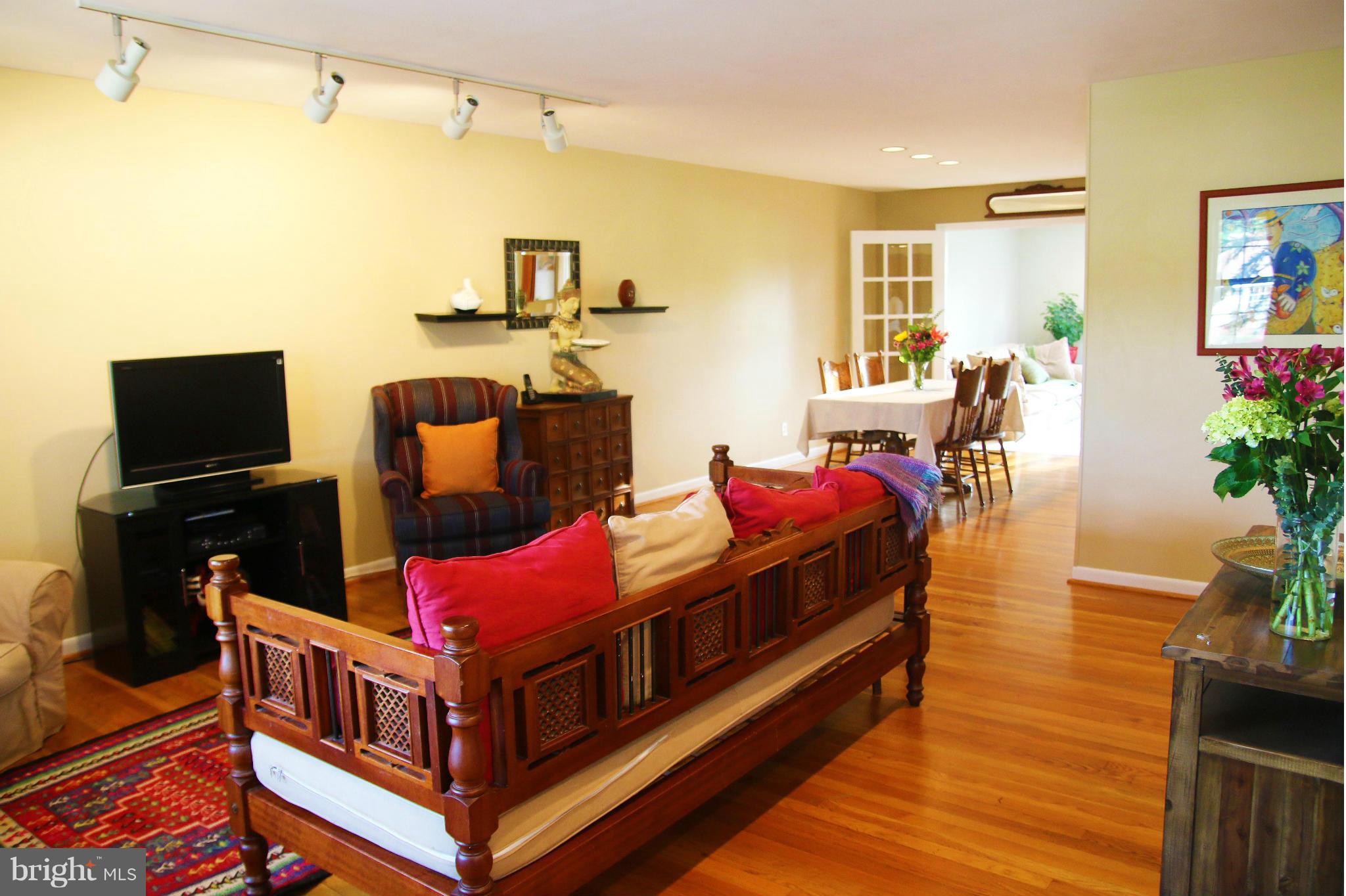 4019 Starbrook Road Randallstown, MD 21133 - Photo 5 of 28 a bedroom with furniture and a flat screen tv