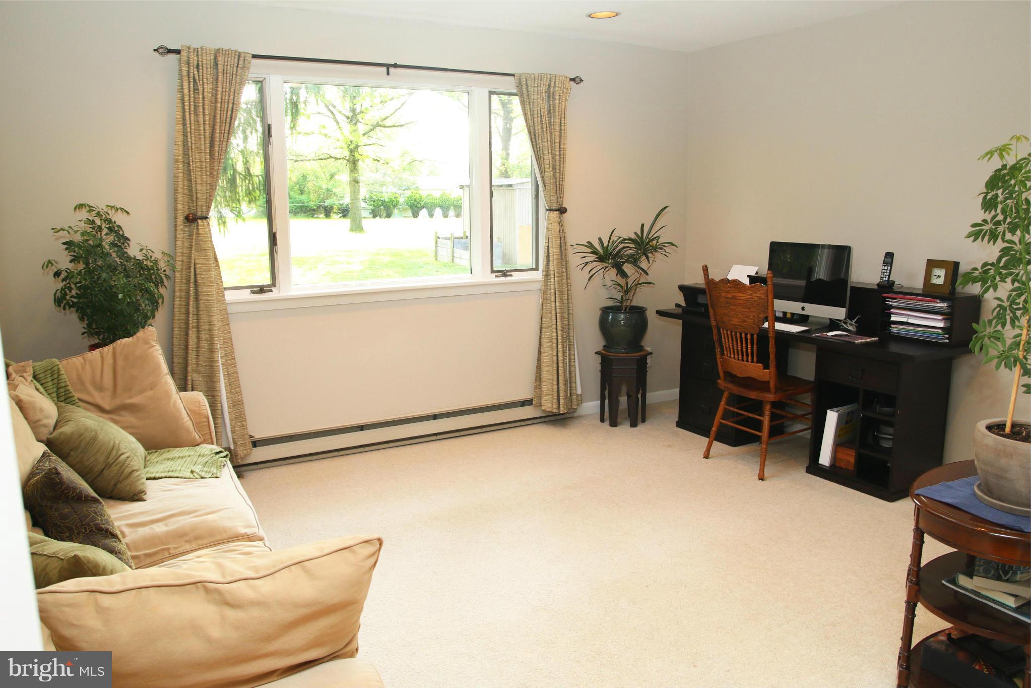 4019 Starbrook Road Randallstown, MD 21133 - Photo 6 of 28 a room with furniture and a window