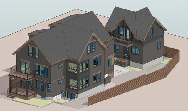 a front view of a residential apartment building with a yard