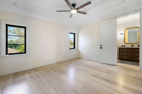 a living room with furniture and garden view