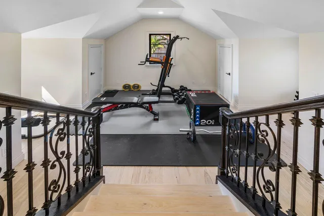 a front view of a house with swimming pool having outdoor seating