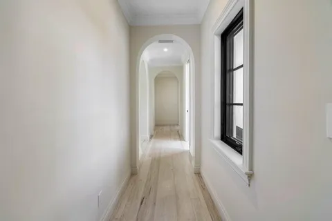 a view of a swimming pool with a patio and a yard