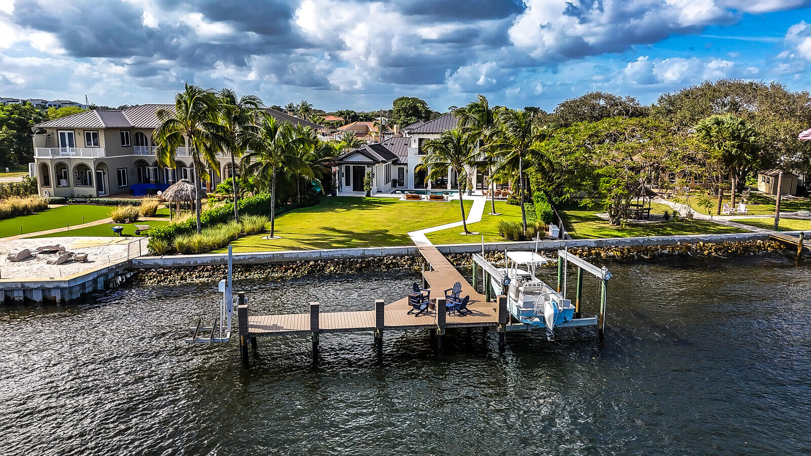 14140 Paradise Point Road Palm Beach Gardens, FL 33410 - Photo 70 of 148 a view of swimming pool with outdoor seating yard and barbeque oven