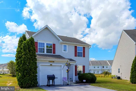 a view of a house with entertaining space