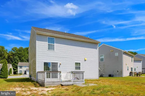 a view of a house with swimming pool