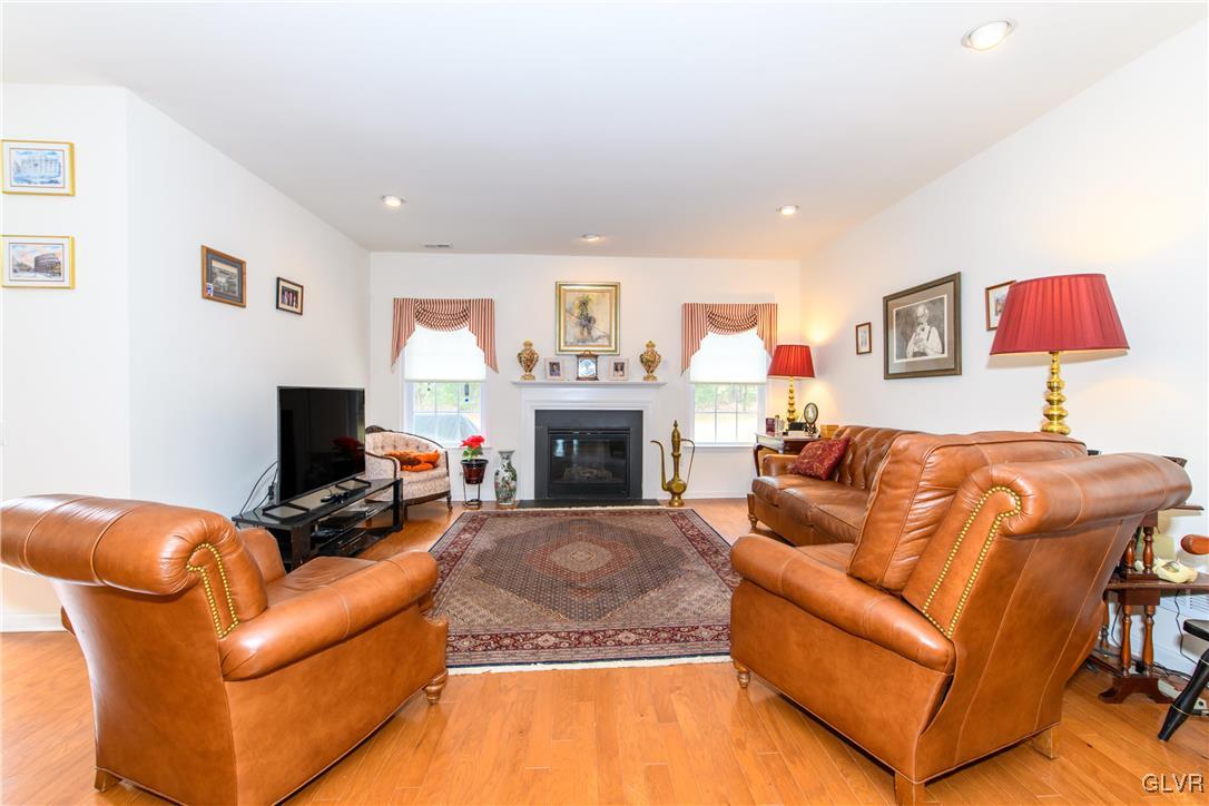 1023 Resolution Drive Bethlehem, PA 18017 - Photo 13 of 26 a living room with furniture and a fireplace