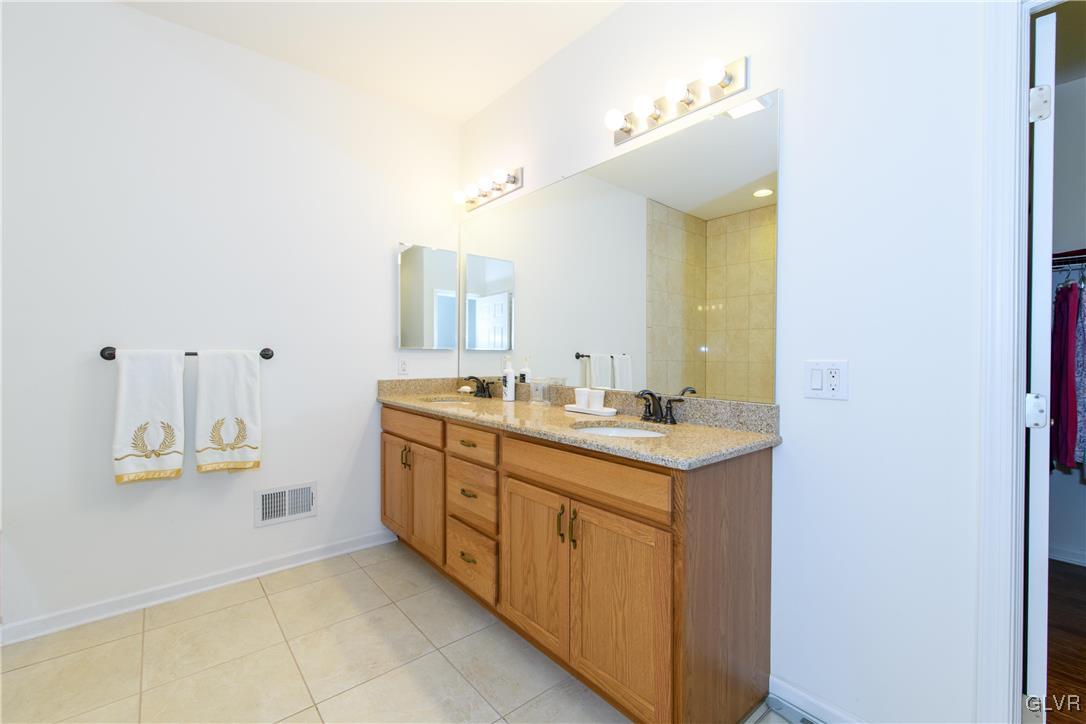 1023 Resolution Drive Bethlehem, PA 18017 - Photo 17 of 26 a bathroom with a sink and a mirror