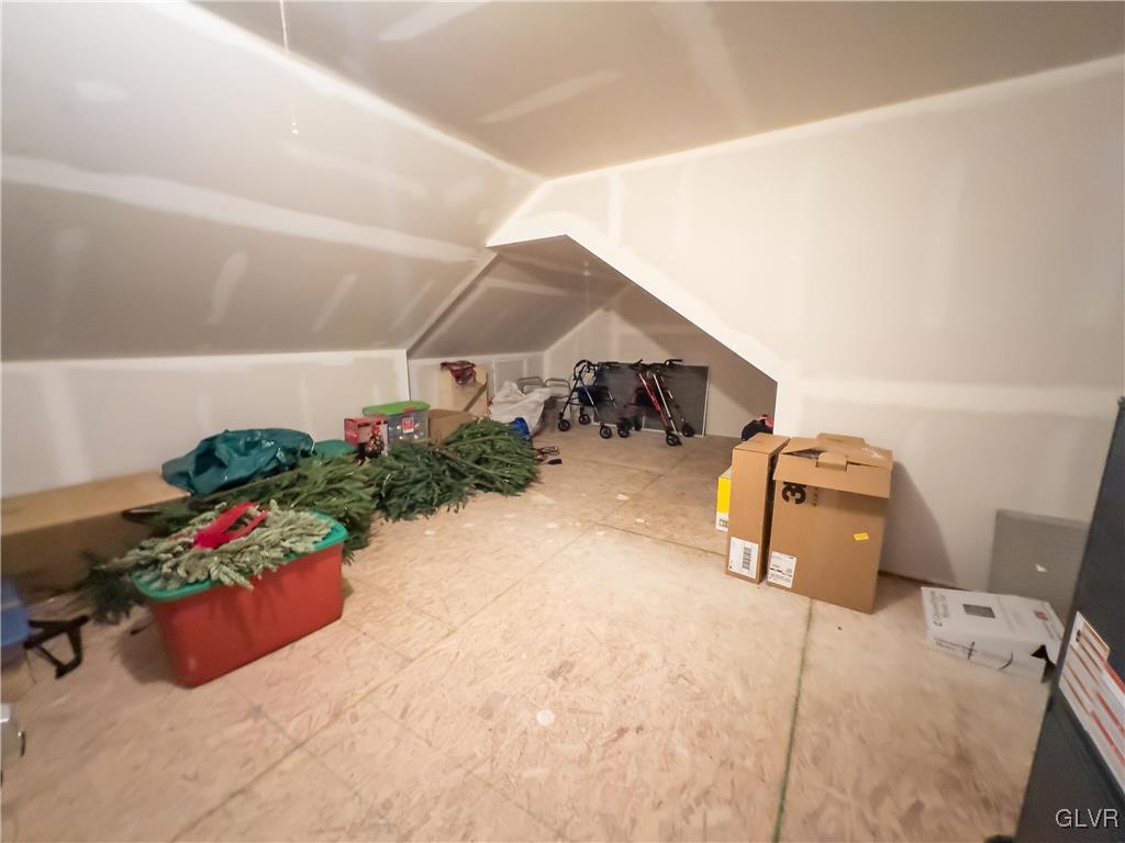 1023 Resolution Drive Bethlehem, PA 18017 - Photo 23 of 26 a bedroom with furniture and a potted plant