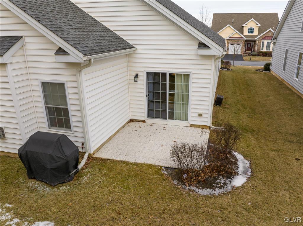 1023 Resolution Drive Bethlehem, PA 18017 - Photo 24 of 26 a front view of a house with a yard