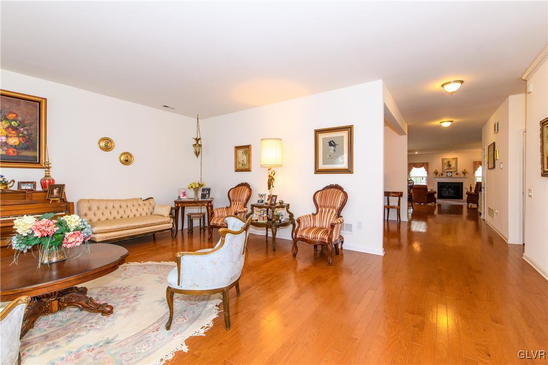 1023 Resolution Drive Bethlehem, PA 18017 - Photo 5 of 26 a living room with furniture and wooden floor