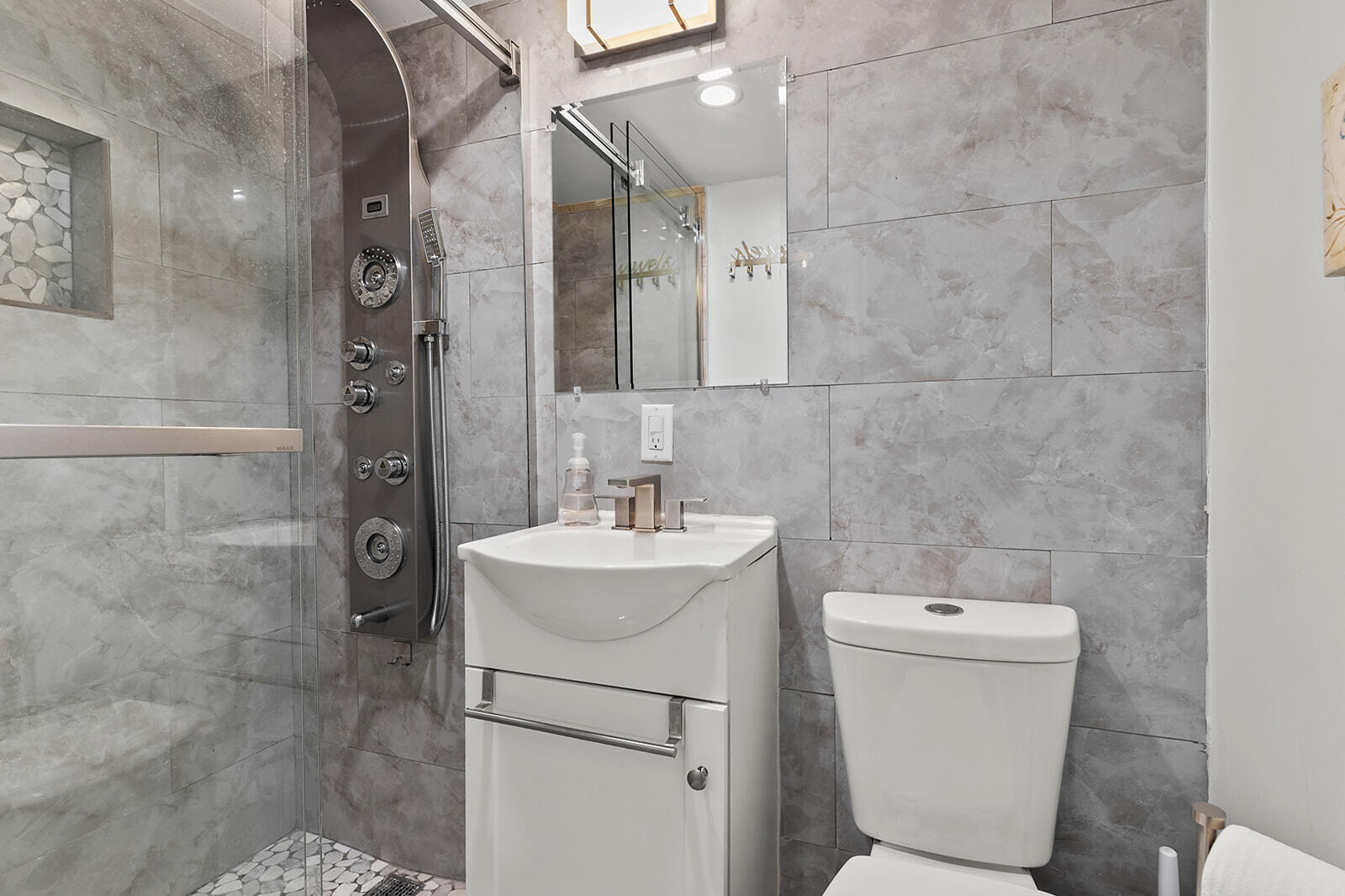 65821 Overseas Highway, Unit 35 Long Key, FL 33001 - Photo 19 of 82 a bathroom with a toilet sink and shower