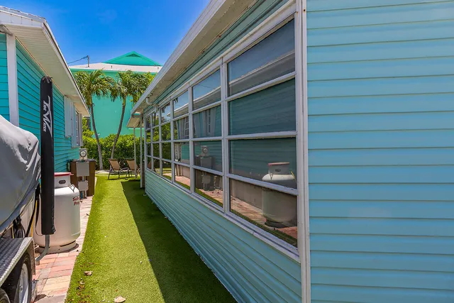 a room with furniture a table and a potted plant