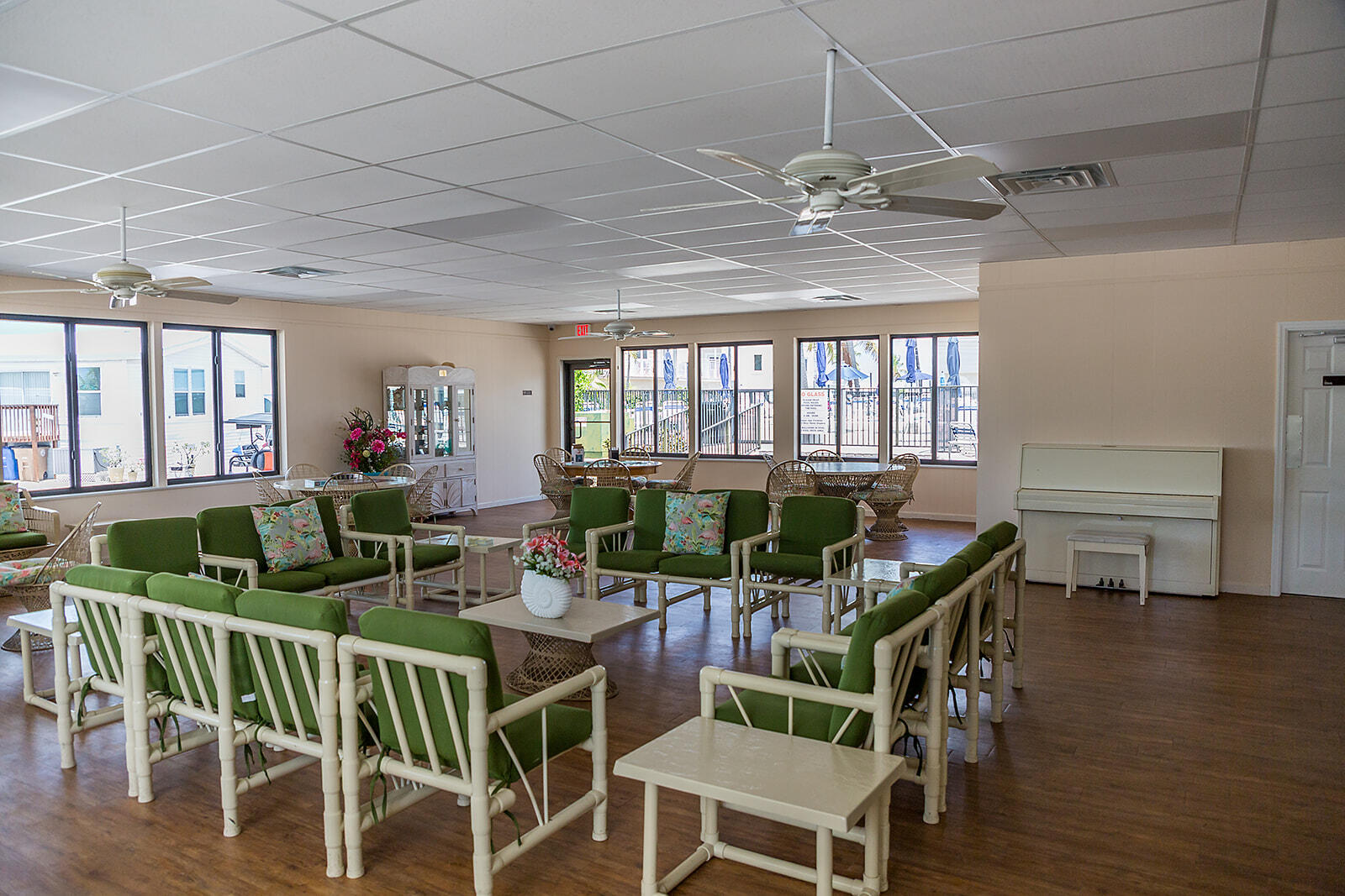 65821 Overseas Highway, Unit 35 Long Key, FL 33001 - Photo 39 of 82 a view of a dining room with furniture window and wooden floor