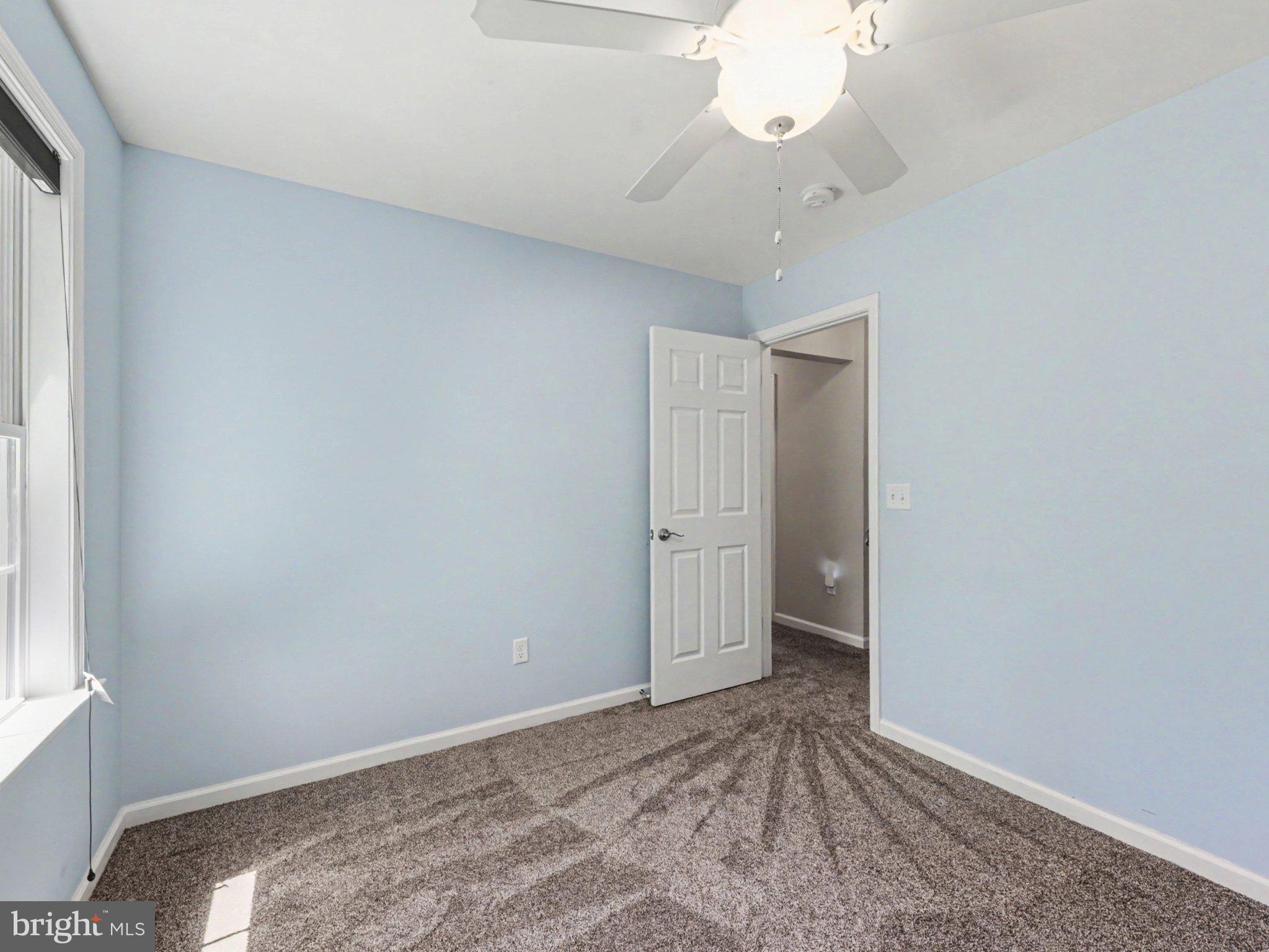9811 Catharpin Road Spotsylvania, VA 22551 - Photo 21 of 30 a view of room with a ceiling fan and window